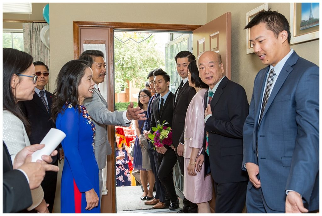 Sandar's family is welcomed into the house during this engagement ceremony