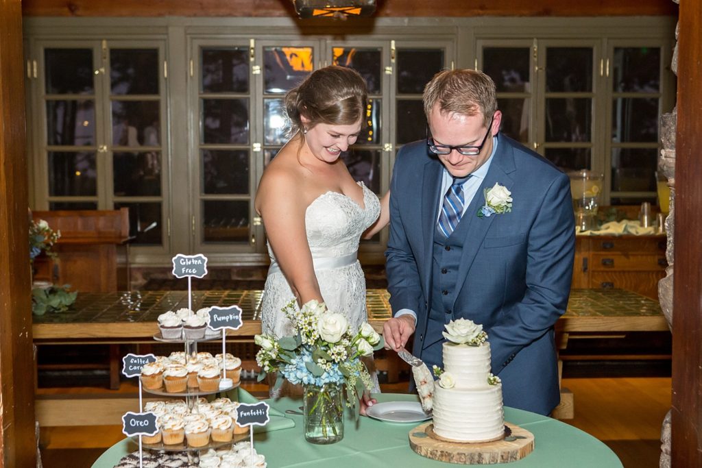 Colorado wedding photographer cake cutting