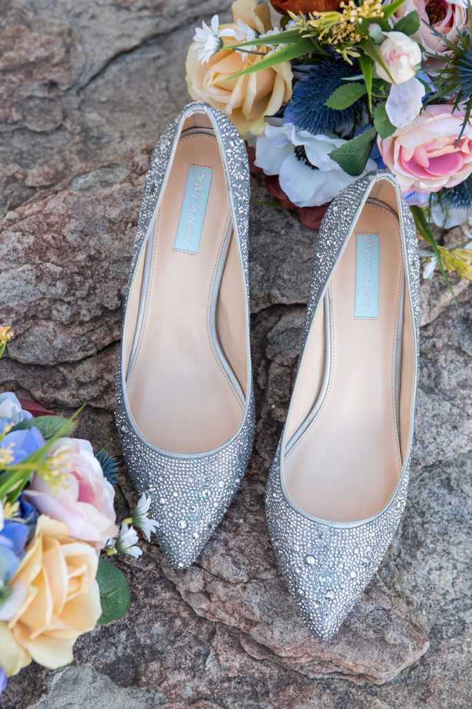 bride details - shoes and flowers
