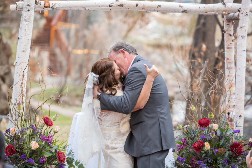 Boulder weddings at Wedgewood Boulder Creek first kiss