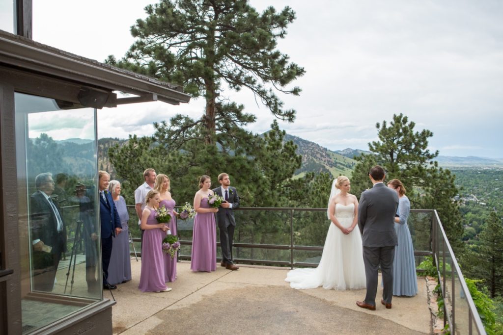 Boulder elopement photographer capturing the ceremony at the Flagstaff House 