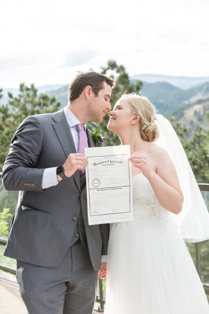 Boulder elopement photographer with Lauren, Ben and their marriage license