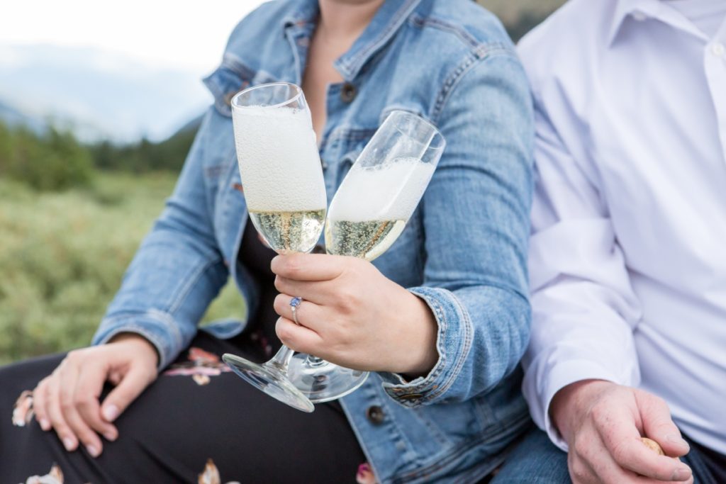 Colorado engagement photos with champagne