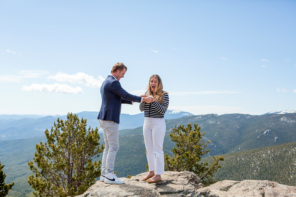 Savannah's reaction of excitement during their proposal at Juniper Pass
