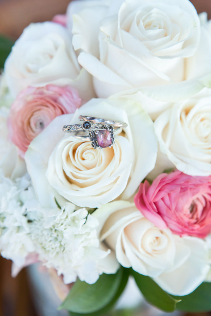 Ring and flower details during a Boulder Country Club wedding