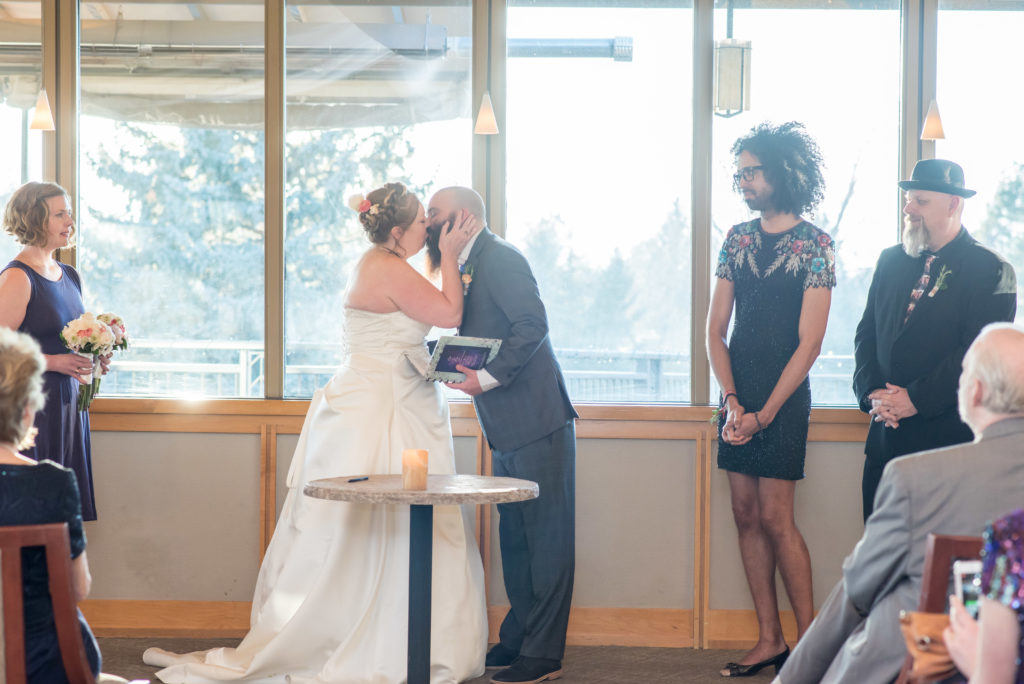 Ceremony kiss during Boulder Country Club wedding