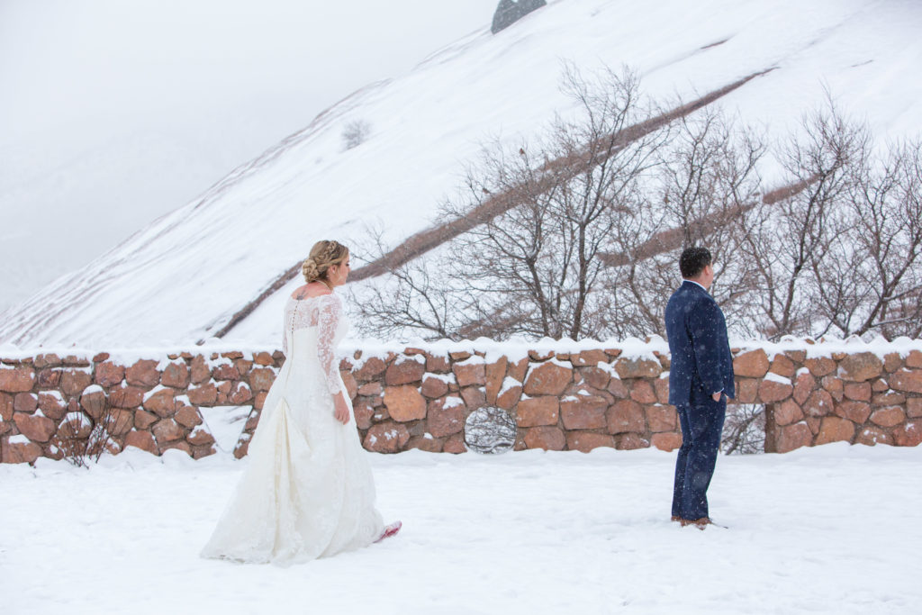 photo of couple's first look in the snow - - Nichole Emerson Photography