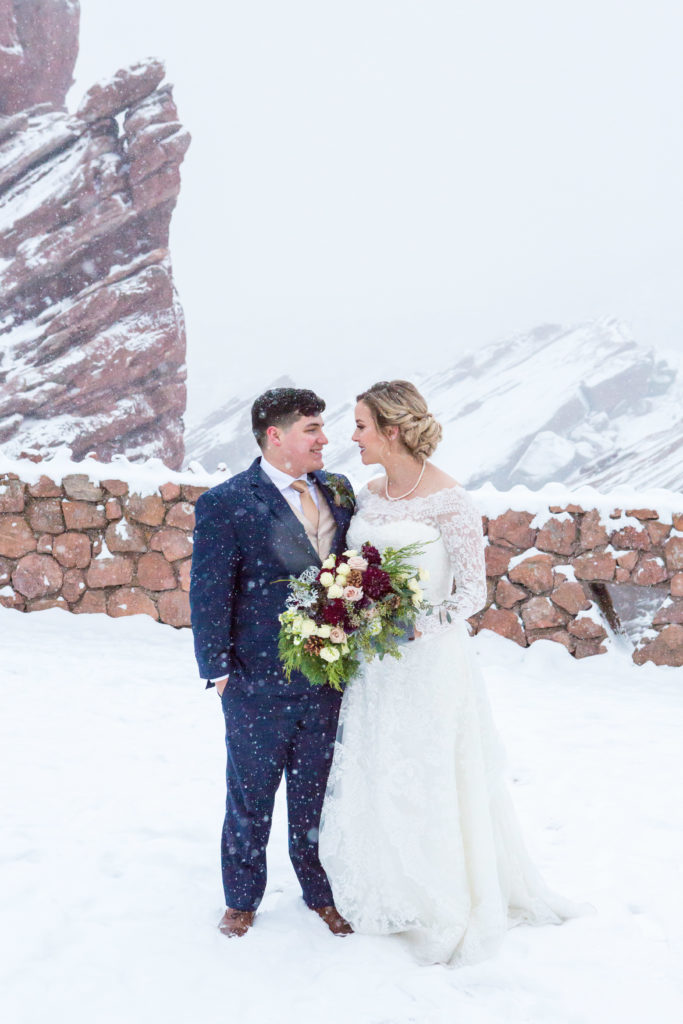 Couple portrait at Red Rocks Park in the snow - - Nichole Emerson Photography