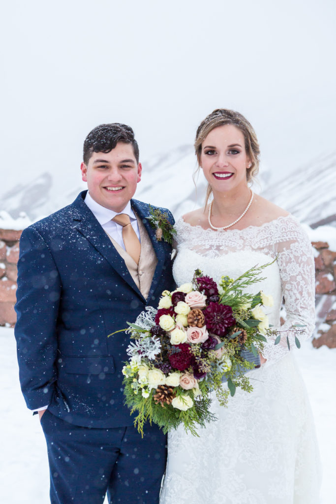 Close up Couple Portrait at Red Rocks Park in the snow - - Nichole Emerson Photography