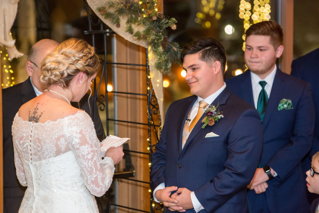groom during the ceremony - - Nichole Emerson Photography