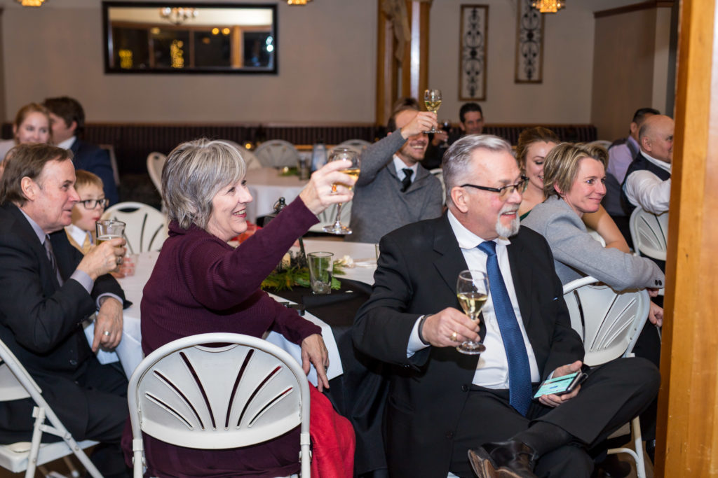 guests toasting during the reception - - Nichole Emerson Photography