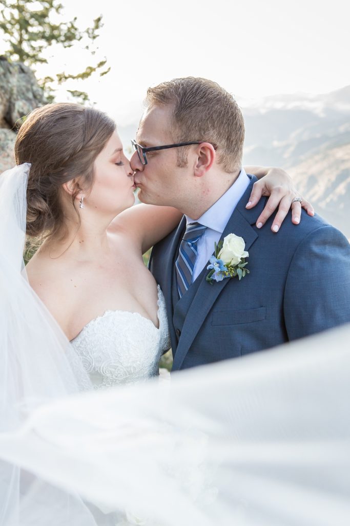 romantic portraits of bride and groom at Lookout Mountain in Golden Colorado