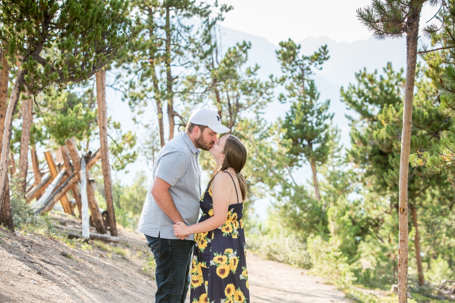 Breckenridge engagement photographer at Sapphire Point with Riley and Tanner