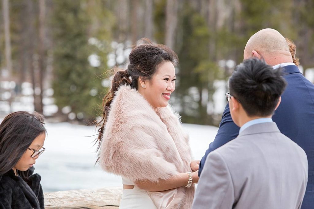 vows at winter elopement in Colorado