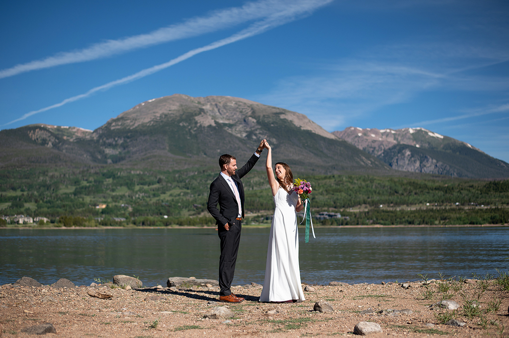 Sarah and Sam dancing on the shores of Lake Dillon on their wedding.