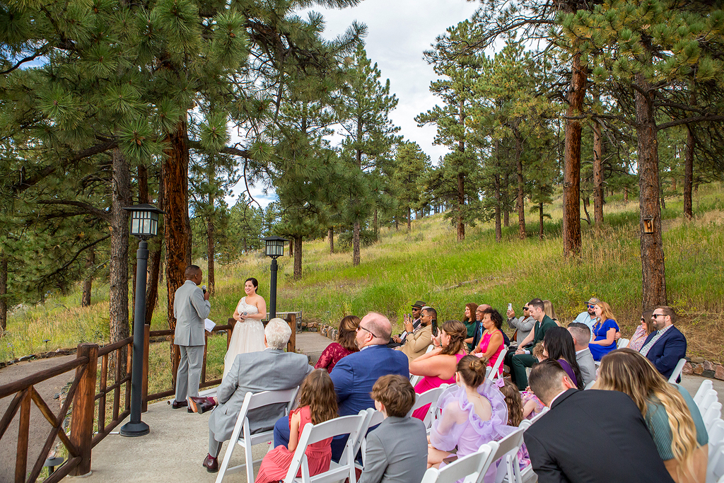 Wedding ceremony in Evergreen, Colorado at Chief Hosa Lodge.