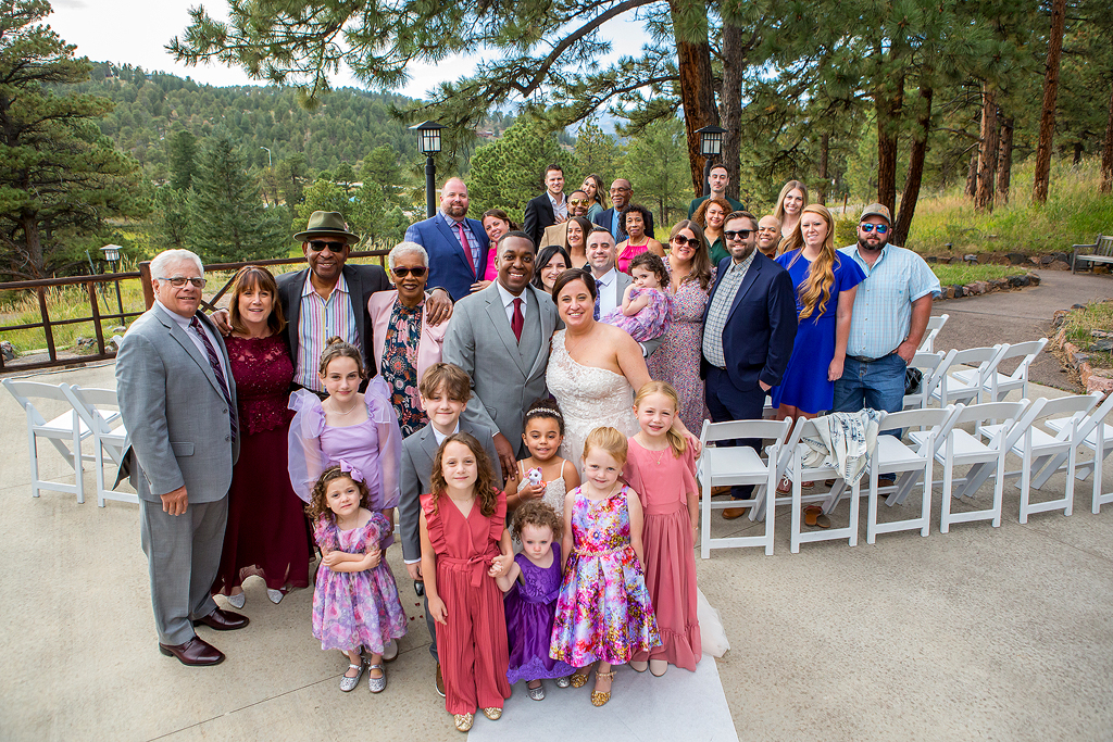 Intimate wedding group at Chief Hosa Lodge, couple and guests.