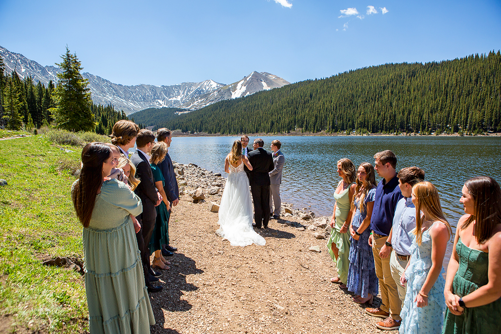 Mountain elopement ceremony at Clinton Gulch Dam Reservoir in Colorado.