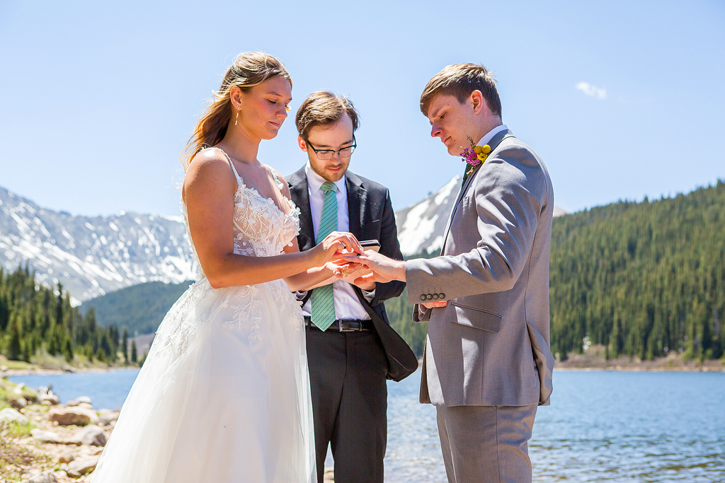 Madi and Chase exchange rings during their elopement.