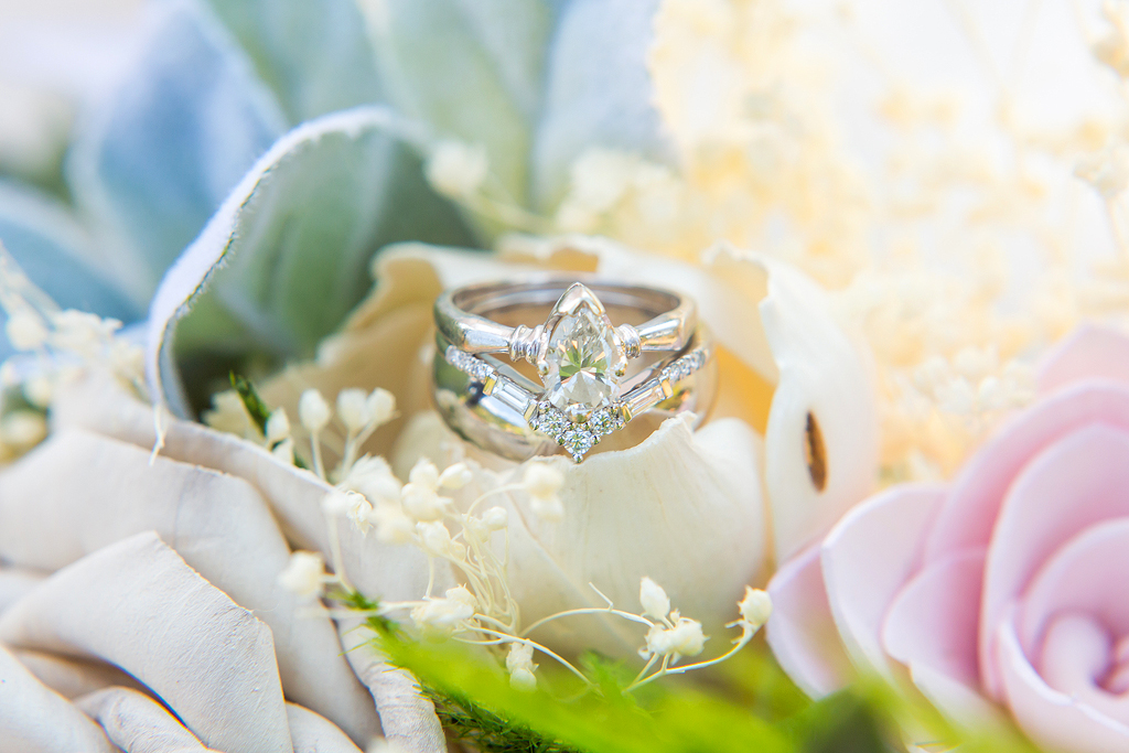 Close up of wedding rings in a bridal bouquet in Colorado.