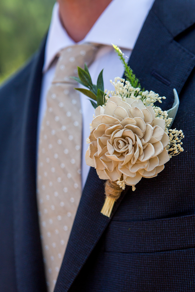 Close up of groom's boutonniere