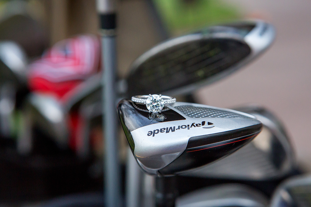 Close-up of Morgan’s engagement ring on top of her golf clubs in Colorado Springs.