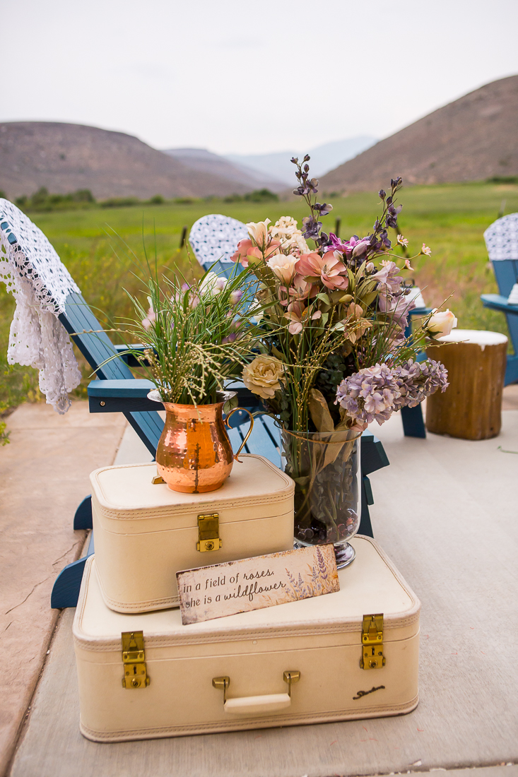 Close up of Colorado elopement decorations wtih wildflowers.