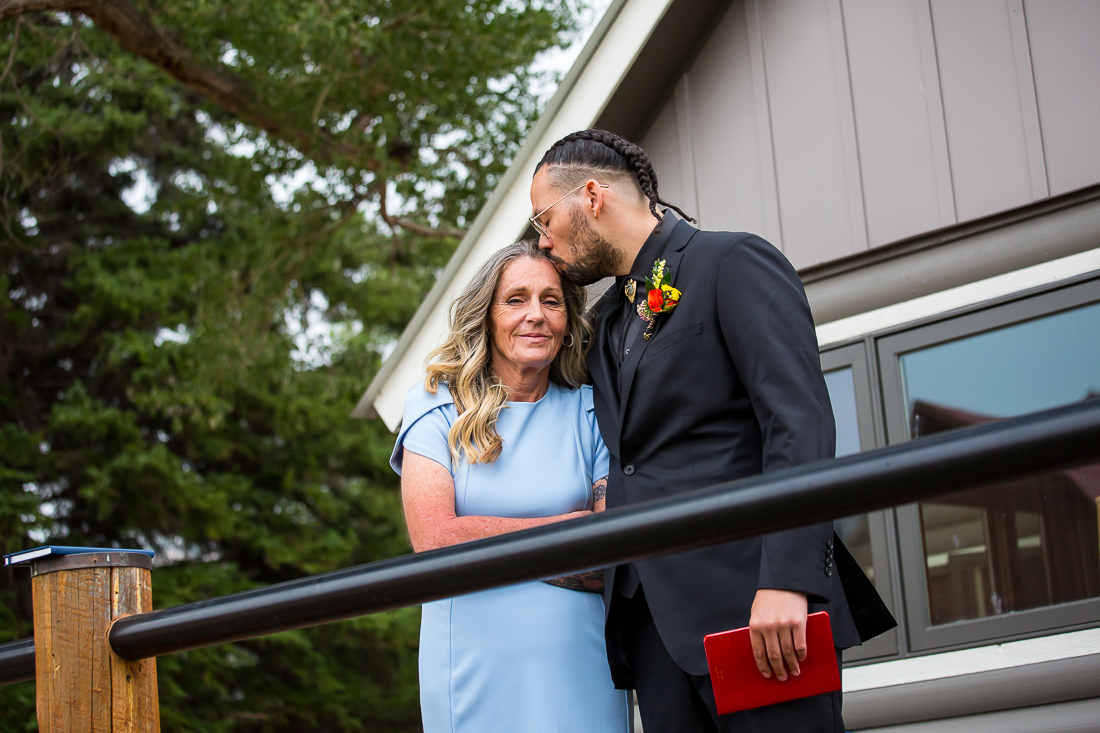 Groom kisses his mom right before the elopement ceremony.