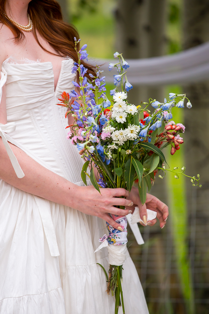 Close up of wildflower bridal bouquet.